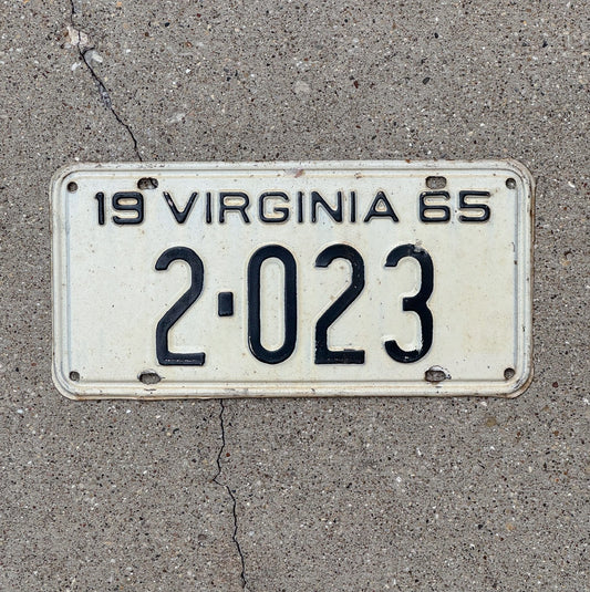 Photo of a 1965 Virginia License Plate Auto Tag Garage Decor Vintage Low Number Four Digit 2 023 with original patina
