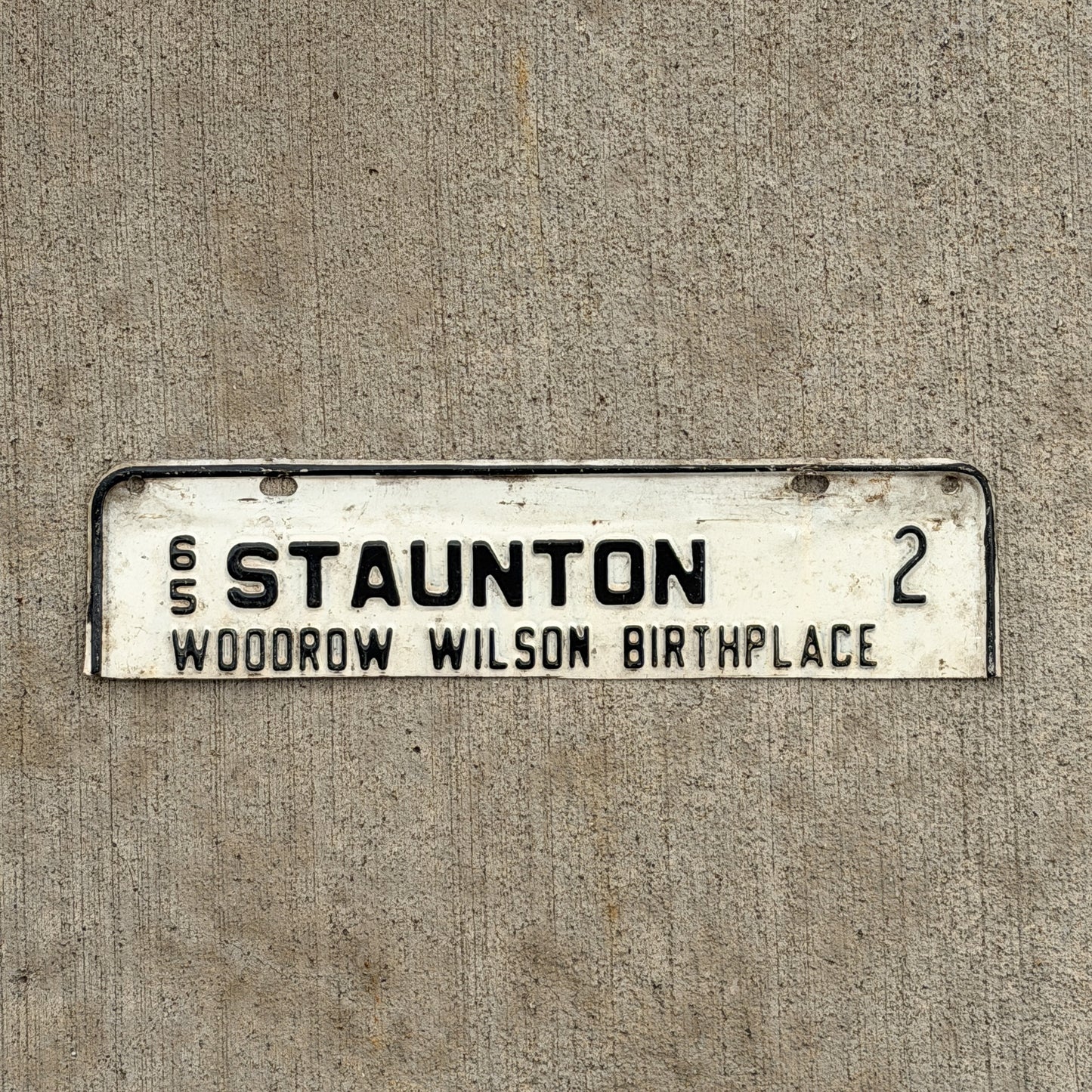 Photo of a 1965 Virginia Tax Strip License Plate Auto Tag Garage Decor Vintage Staunton Woodrow Wilson Birthplace President Low Number 2 with original patina