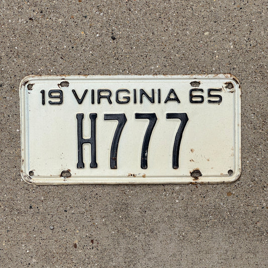 Photo of a 1965 Virginia Taxi Cab License Plate Auto Tag Garage Decor Vintage Repeat Repeating H 777