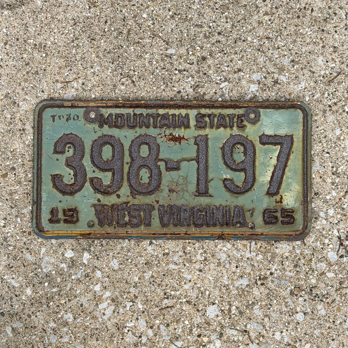 Photo of a 1965 West Virginia License Plate Auto Tag Garage Decor Vintage 398 197 with original patina
