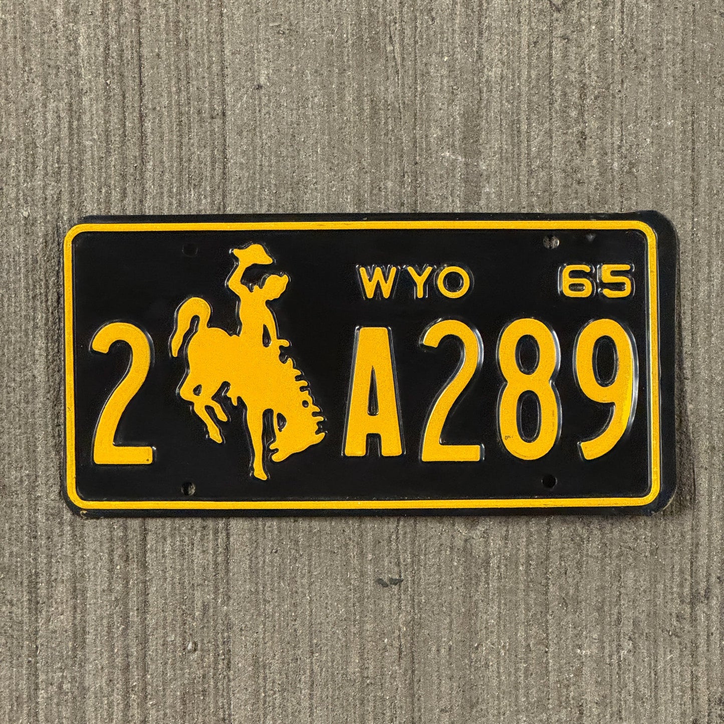Photo of a 1965 Wyoming License Plate Auto Tag Garage Decor Vintage 2 A 289