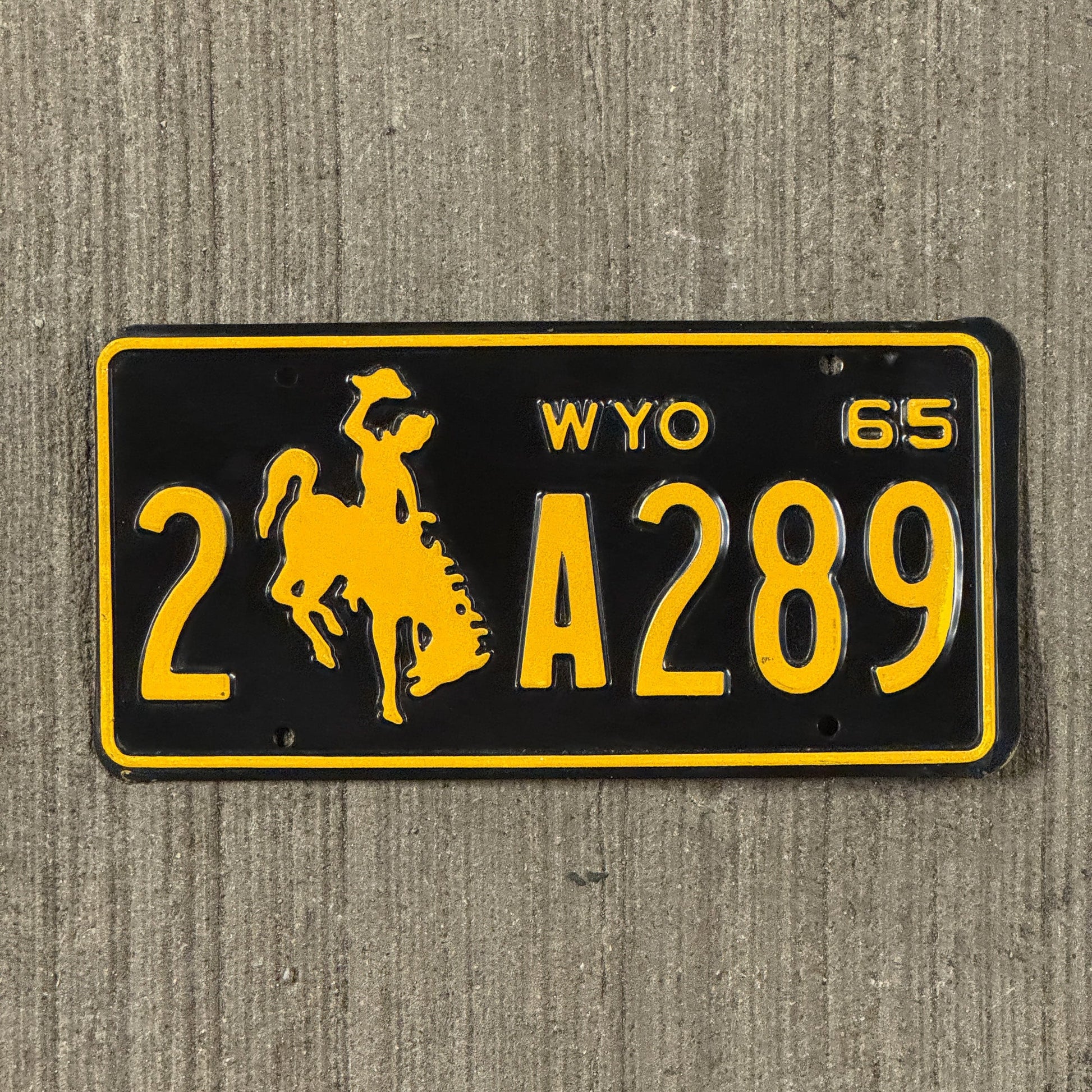 Photo of a 1965 Wyoming License Plate Auto Tag Garage Decor Vintage 2 A 289