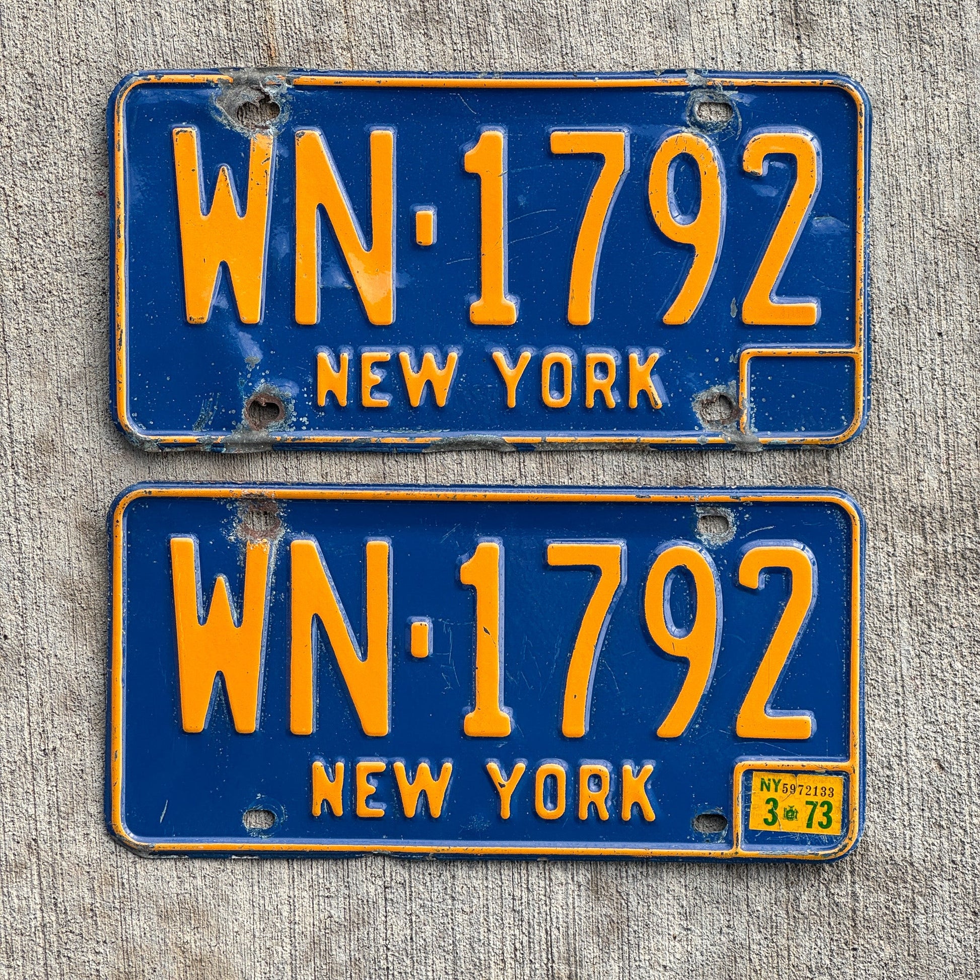 Photo of a 1966 1973 New York License Plate Pair Auto Tag Garage Decor Vintage DMV Clear WN 1792 with original patina