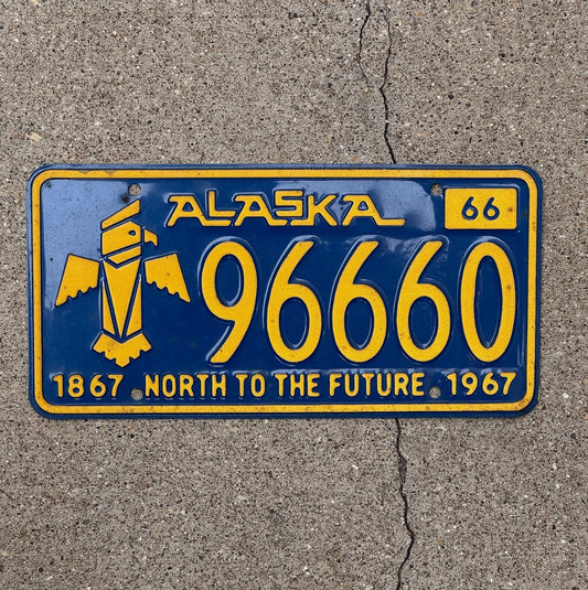 Photo of a 1966 Alaska License Plate Auto Tag Garage Decor Vintage Iconic Totem Repeat Repeating 96660 with original patina