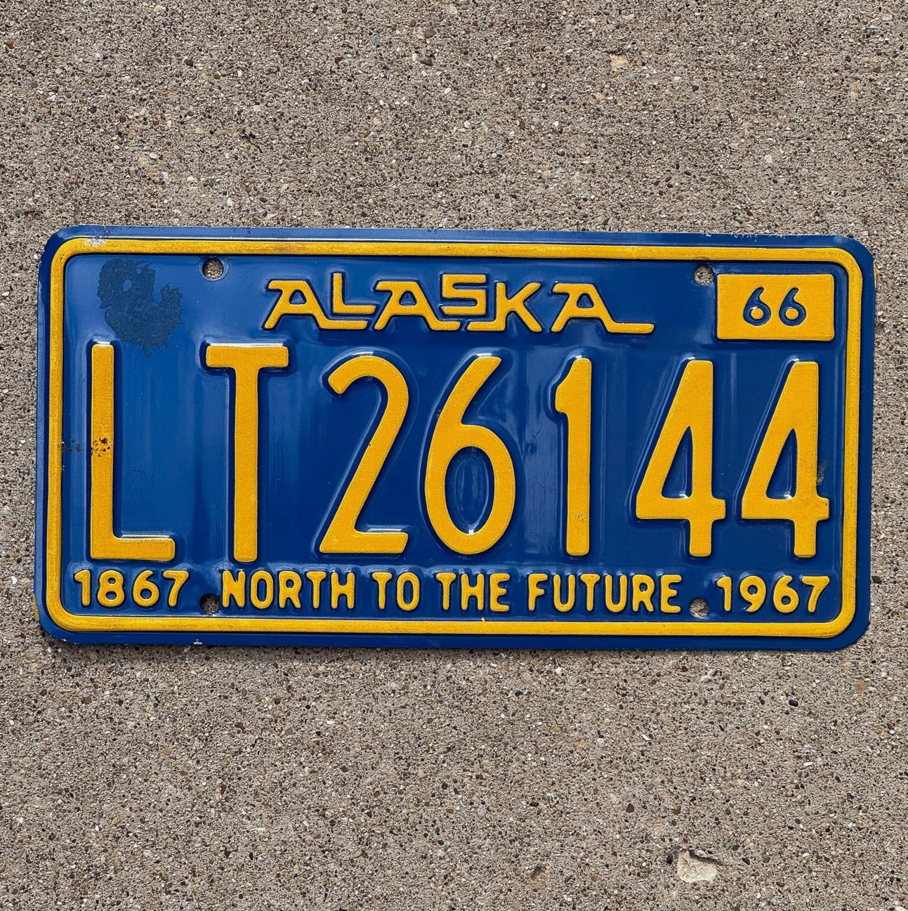 Photo of a 1966 Alaska Truck License Plate Auto Tag Garage Decor Vintage North to the Future LT 26144 with original patina