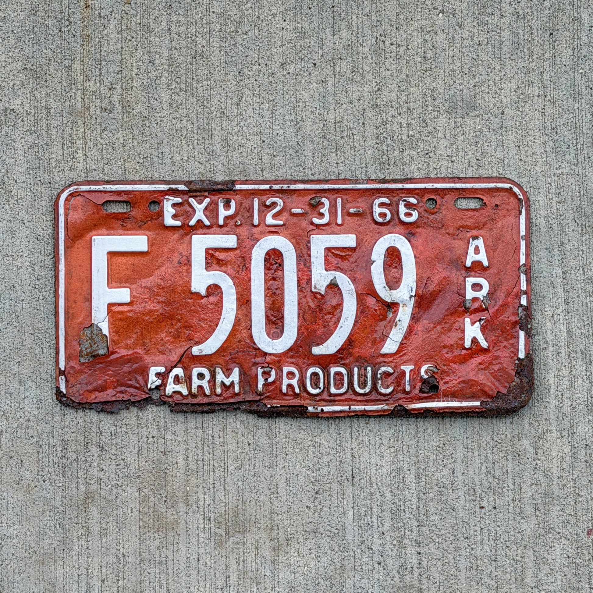 Photo of a 1966 Arkansas Farm License Plate Auto Tag Garage Decor Vintage Half Year F 5059 with original patina