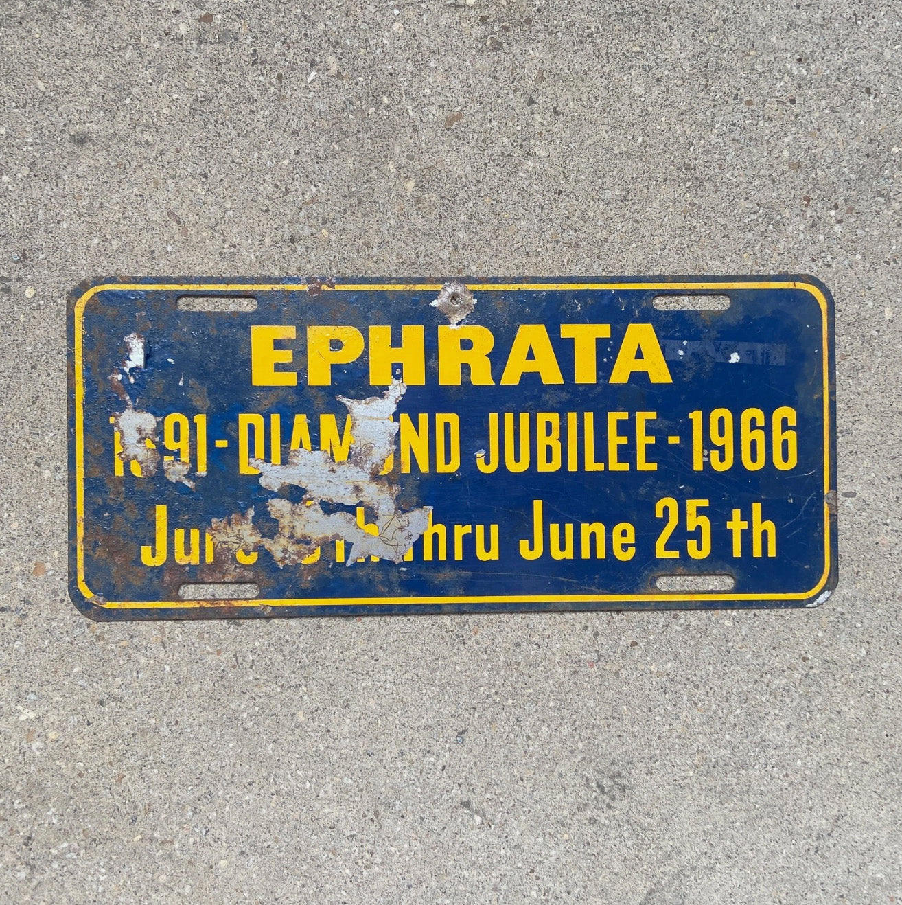 Photo of a 1966 Ephrata Pennsylvania Booster License Plate Auto Tag Garage Decor Vintage Metal Diamond Jubilee with original patina