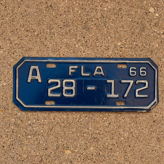 Photo of a 1966 Florida Motorcycle License Plate Auto Tag Garage Decor Vintage Pasco County 3 Digit 28 172 with original patina
