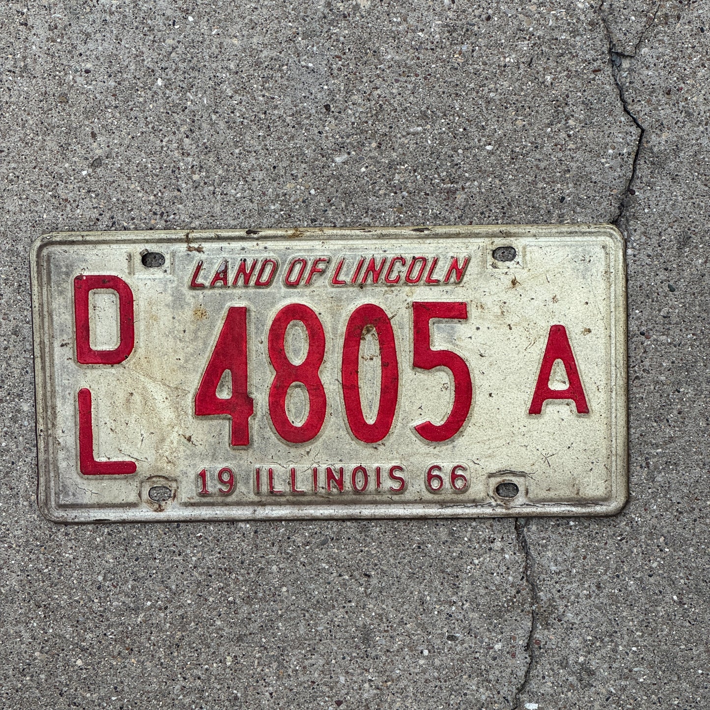 Photo of a 1966 Illinois Dealer License Plate Auto Tag 1 Vintage Garage 4805 A with original patina