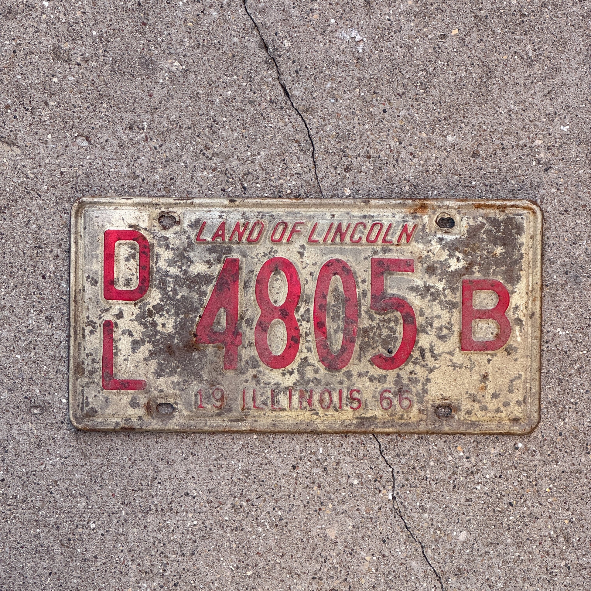 Photo of a 1966 Illinois Dealer License Plate Auto Tag 1 Vintage Garage 4805 B with original patina