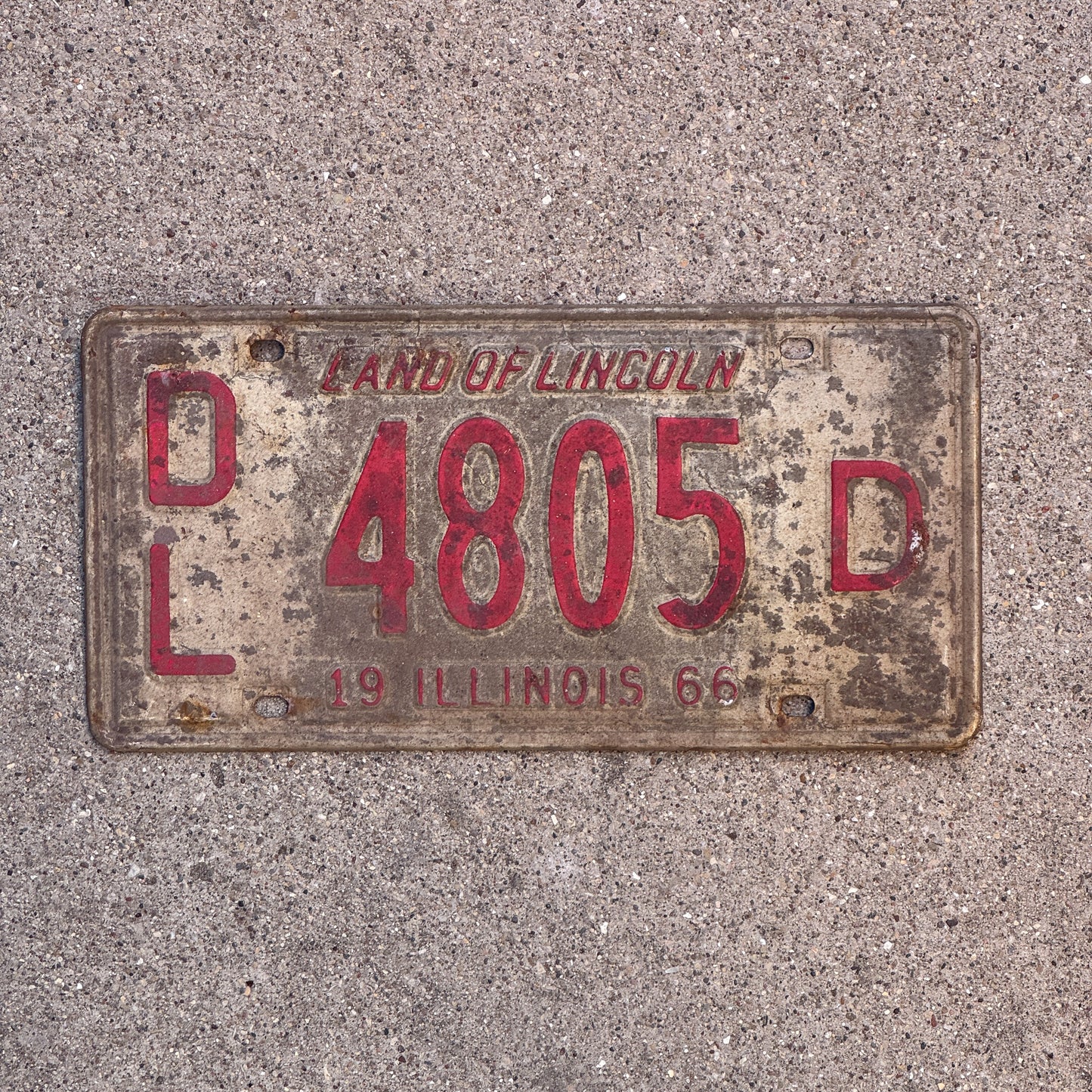 Photo of a 1966 Illinois Dealer License Plate Auto Tag 1 Vintage Garage 4805 D with original patina
