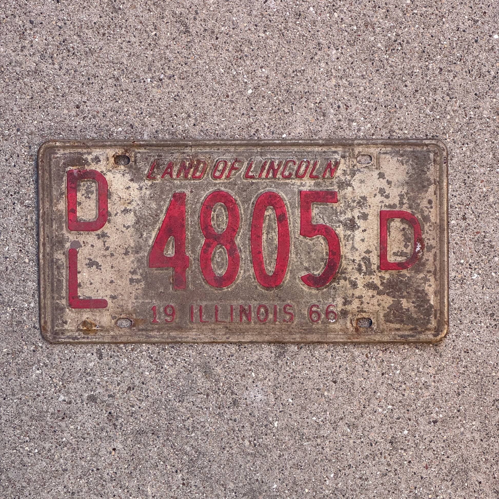 Photo of a 1966 Illinois Dealer License Plate Auto Tag 1 Vintage Garage 4805 D with original patina