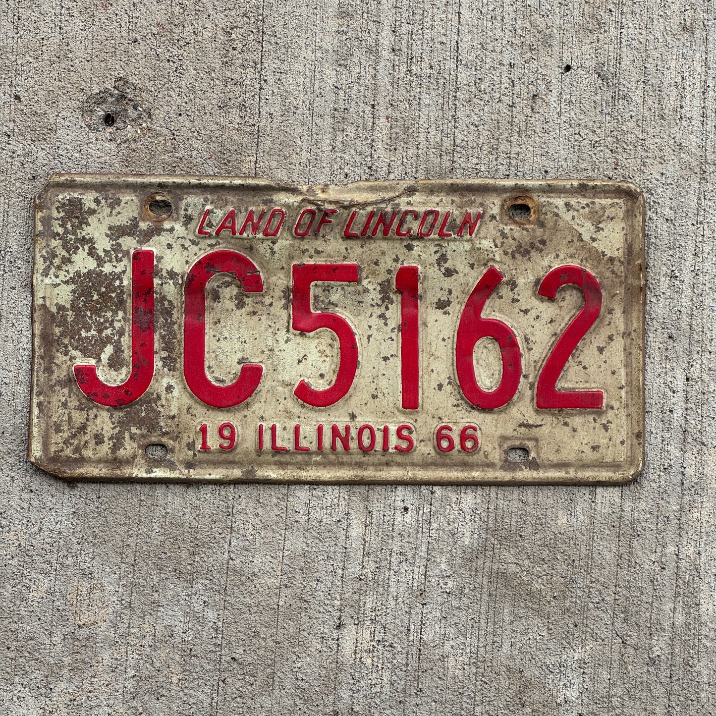 Photo of a 1966 Illinois License Plate Auto Tag 1 Vintage Garage JC 5162 with original patina