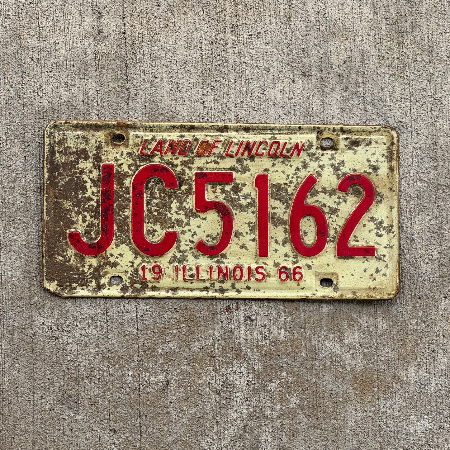 Photo of a 1966 Illinois License Plate Auto Tag 2 Vintage Garage JC 5162 with original patina