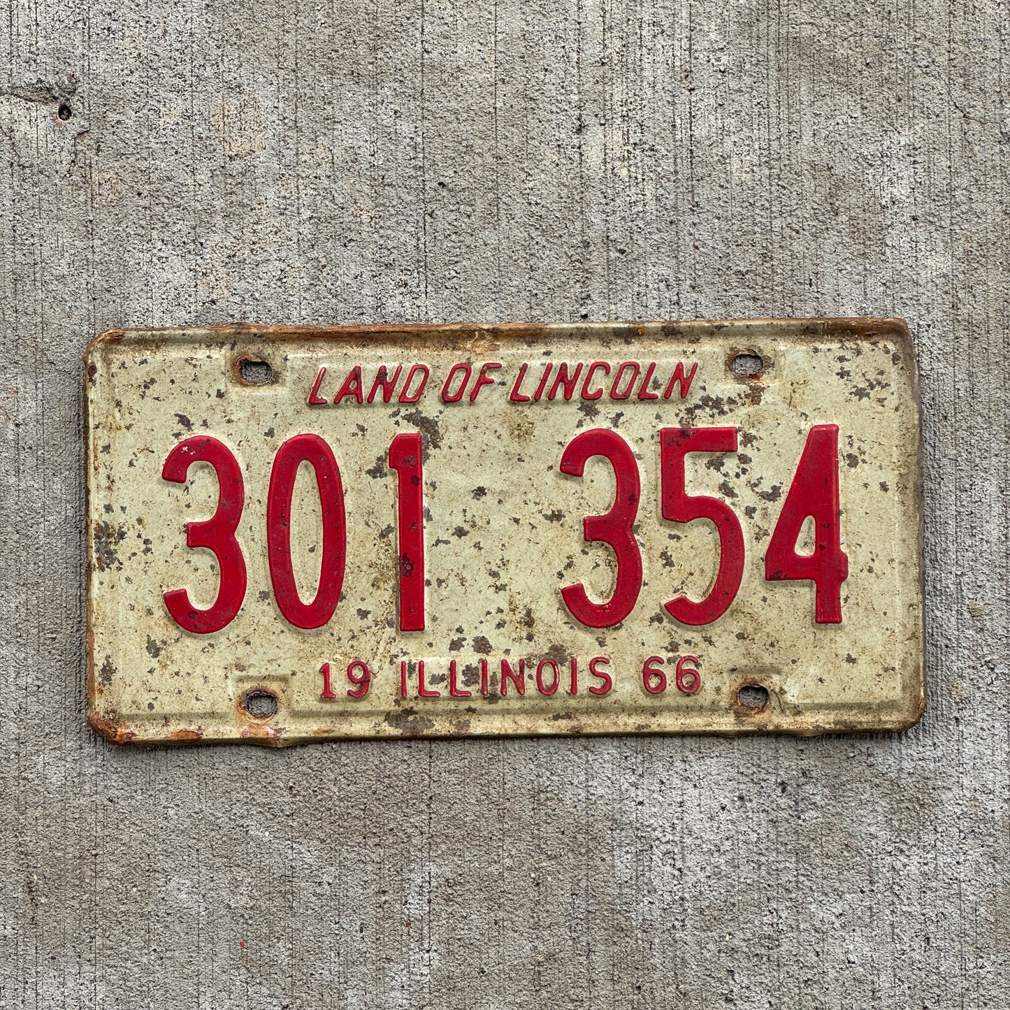 Photo of a 1966 Illinois License Plate Auto Tag Garage Decor Vintage 301 354 with original patina