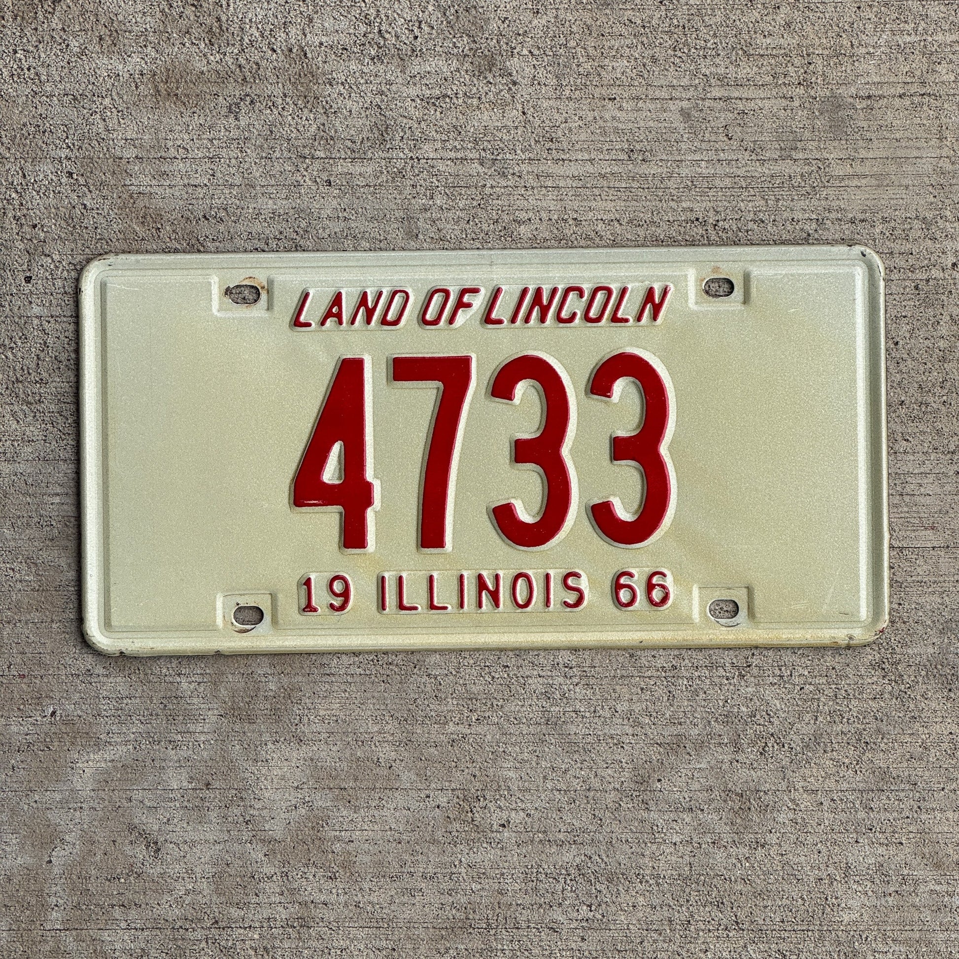 Photo of a 1966 Illinois License Plate Auto Tag Garage Decor Vintage Low Number Four Digit 4733 with original patina