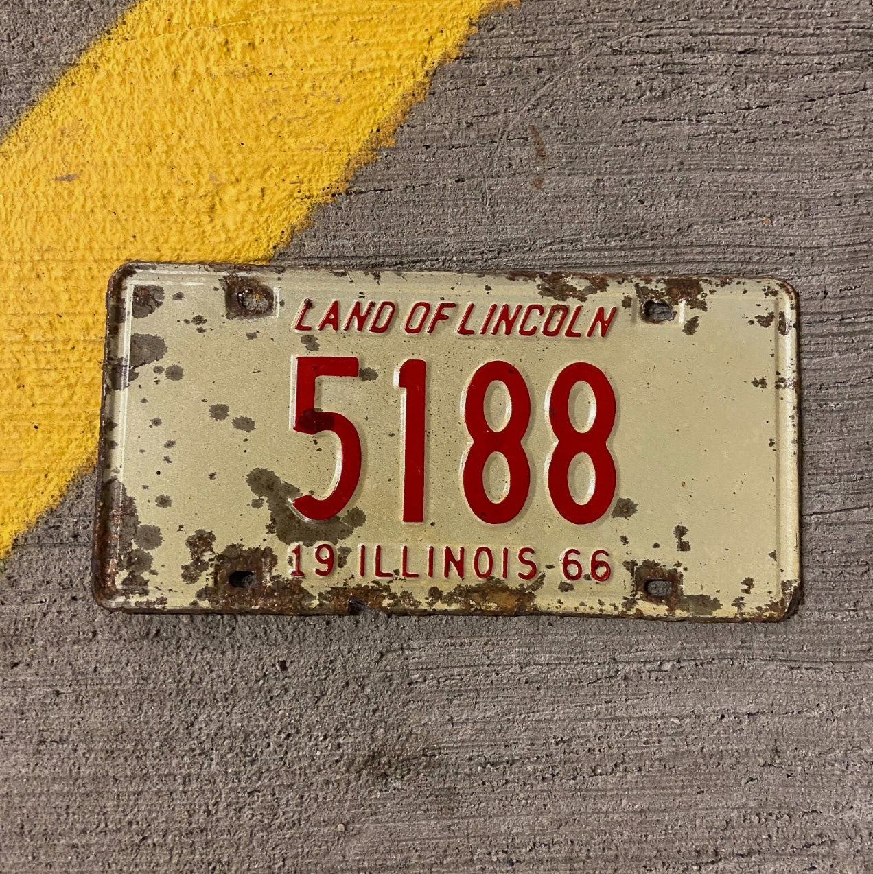 Photo of a 1966 Illinois License Plate Auto Tag Garage Decor Vintage Low Number Four Digit 5188 with original patina