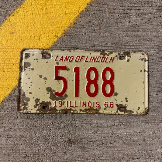 Photo of a 1966 Illinois License Plate Auto Tag Garage Decor Vintage Low Number Four Digit 5188 with original patina