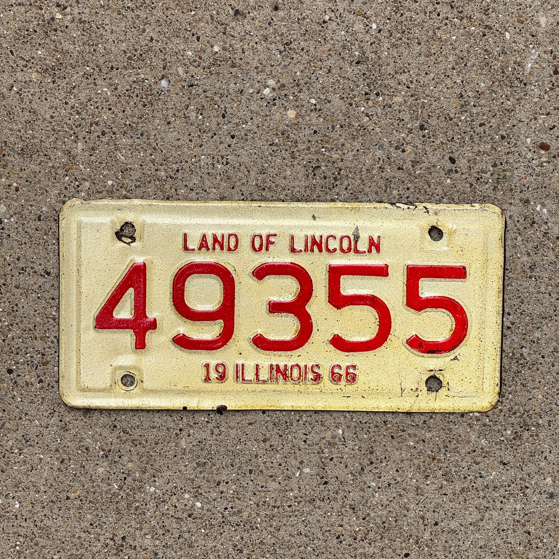 Photo of a 1966 Illinois Motorcycle License Plate Auto Tag Garage Decor Vintage 49355