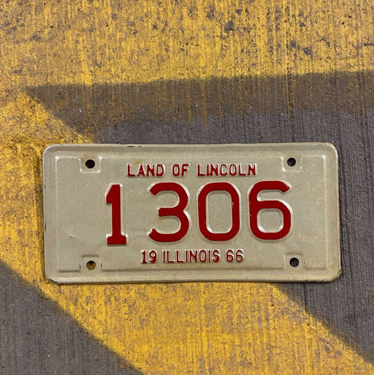 Photo of a 1966 Illinois Motorcycle License Plate Auto Tag Garage Decor Vintage Low Number Four Digit 1306 with original patina