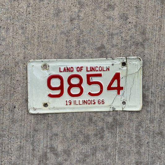 Photo of a 1966 Illinois Motorcycle License Plate Auto Tag Garage Decor Vintage Low Number Four Digit 9854 with original patina
