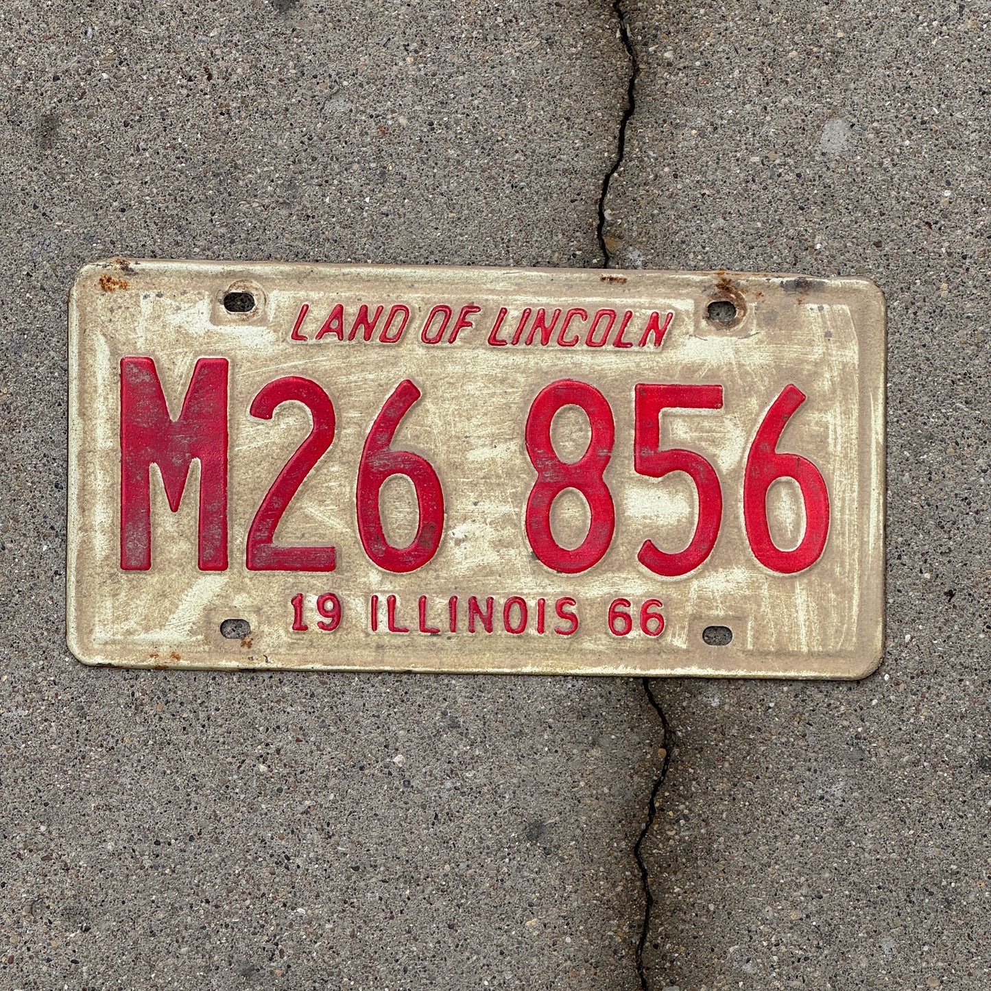 Photo of a 1966 Illinois Municipal License Plate Auto Tag 1 Vintage Garage M 26 856 with original patina