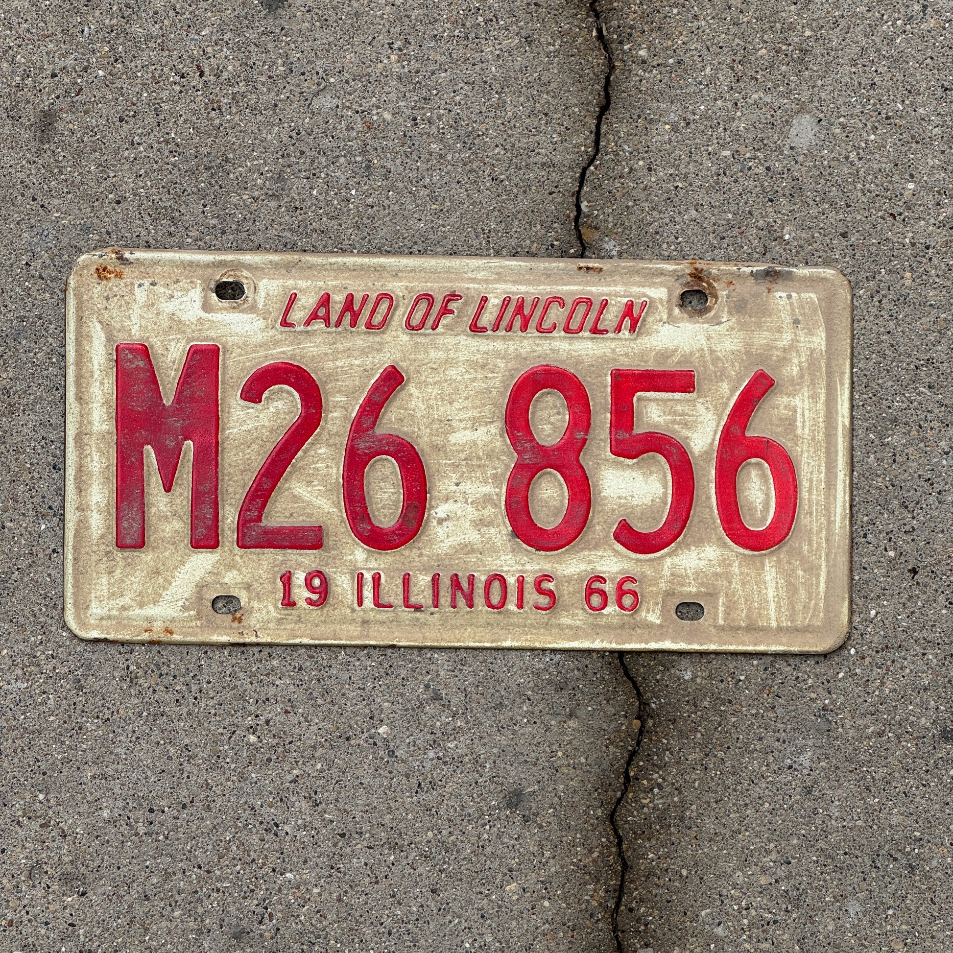 Photo of a 1966 Illinois Municipal License Plate Auto Tag 1 Vintage Garage M 26 856 with original patina