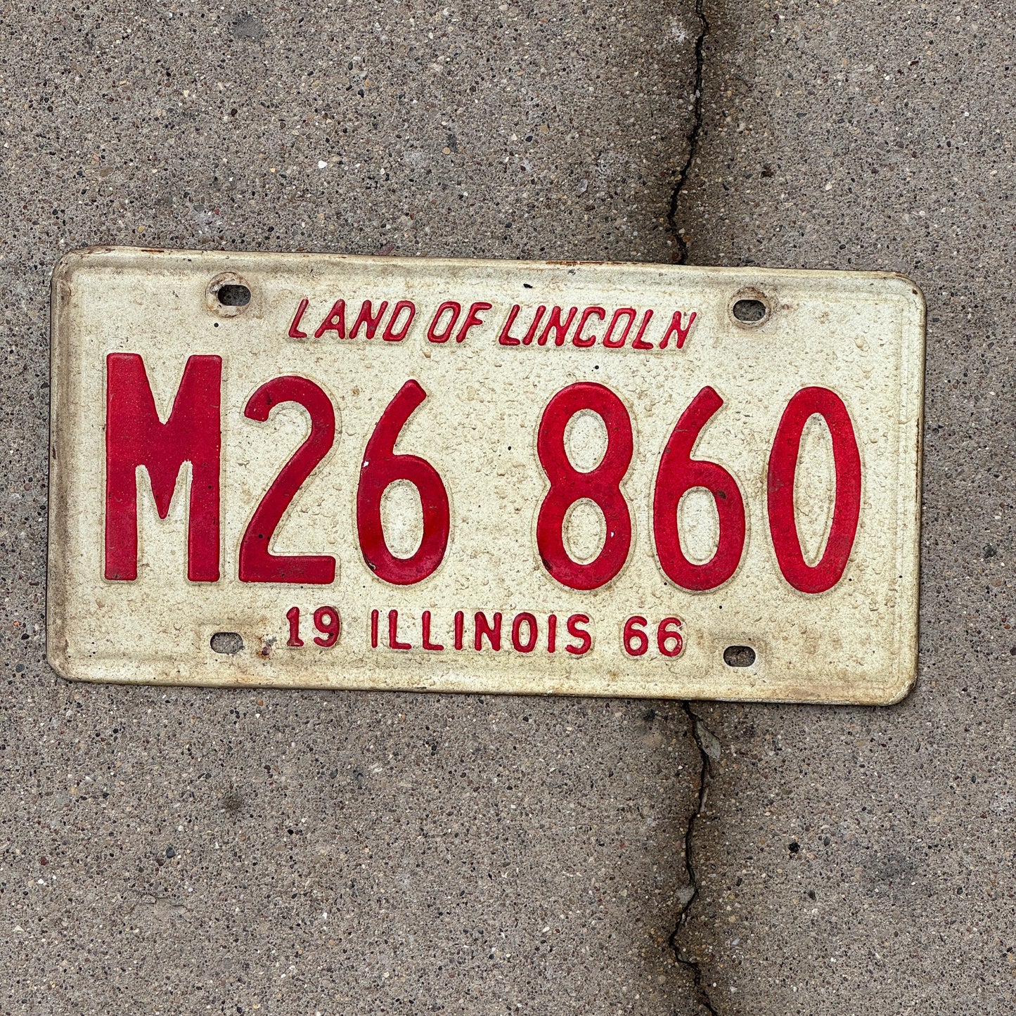 Photo of a 1966 Illinois Municipal License Plate Auto Tag 1 Vintage Garage M 26 860 with original patina