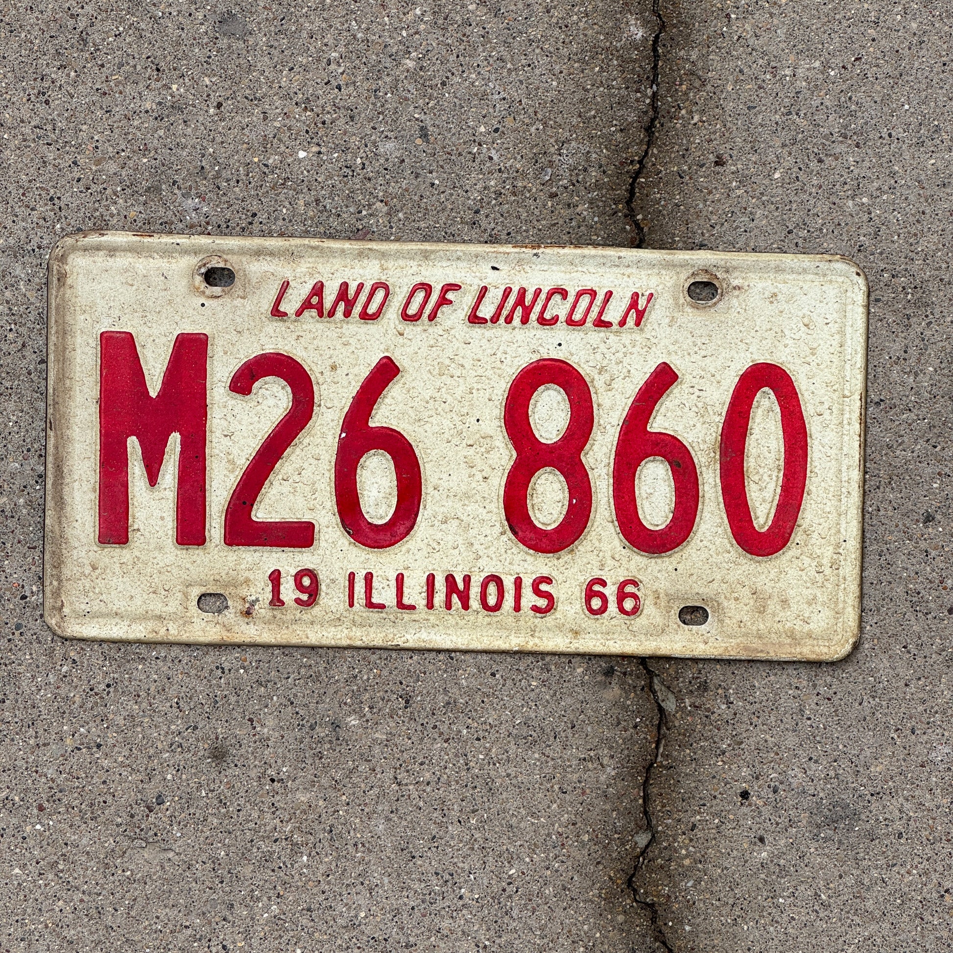 Photo of a 1966 Illinois Municipal License Plate Auto Tag 1 Vintage Garage M 26 860 with original patina