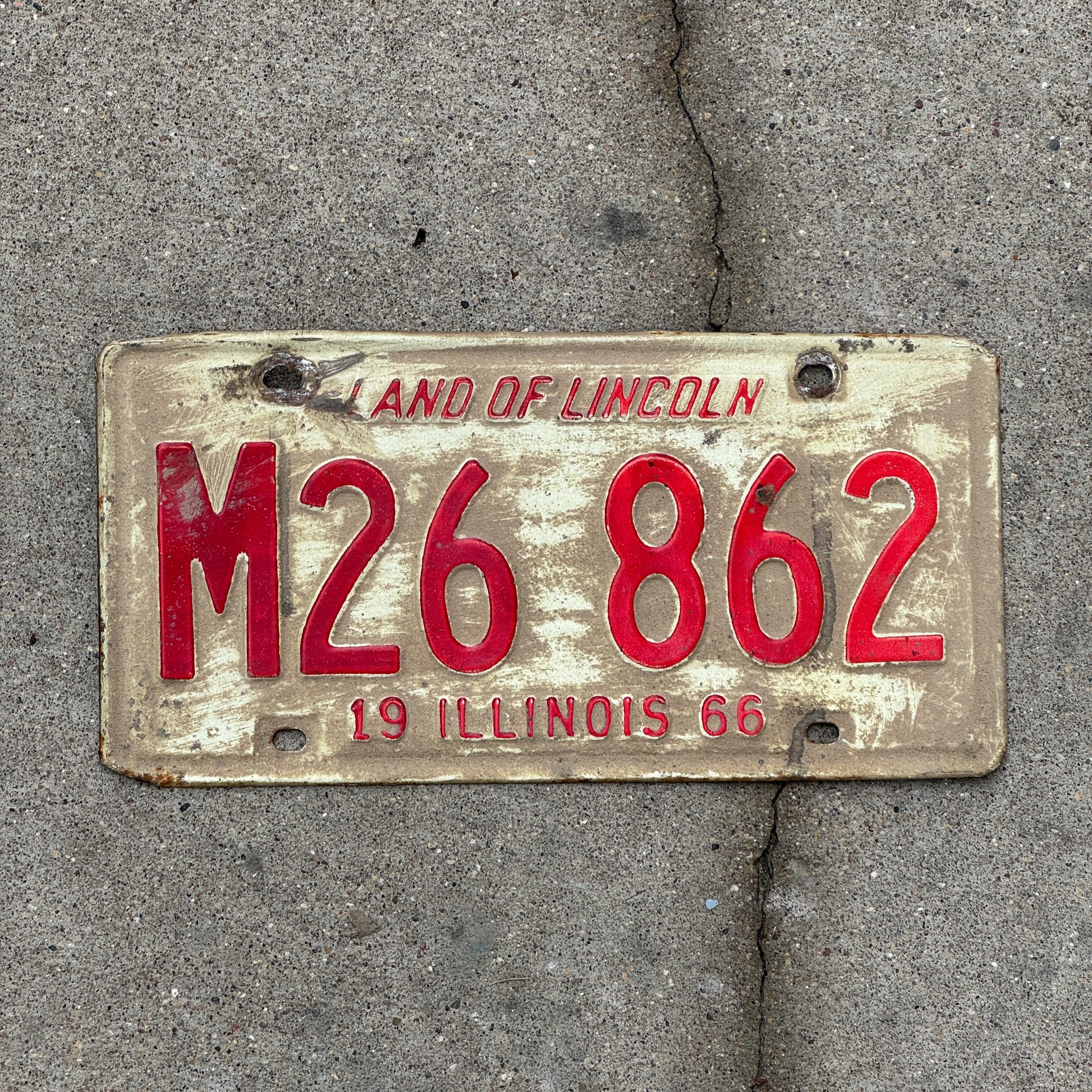Photo of a 1966 Illinois Municipal License Plate Auto Tag 1 Vintage Garage M 26 862 with original patina