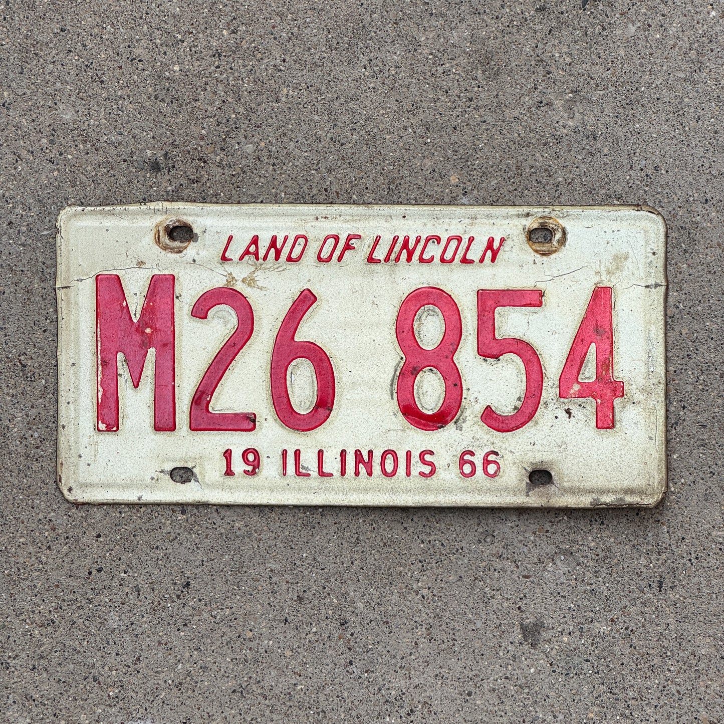 Photo of a 1966 Illinois Municipal License Plate Auto Tag 2 Vintage Garage M 26 854 with original patina