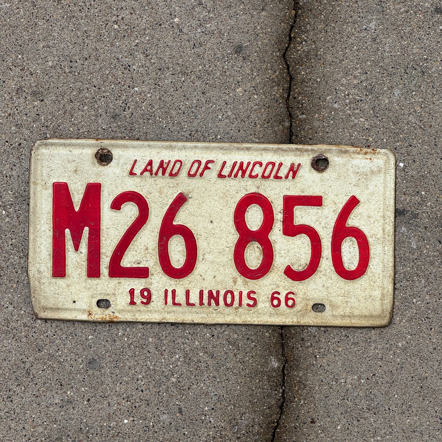 Photo of a 1966 Illinois Municipal License Plate Auto Tag 2 Vintage Garage M 26 856 with original patina