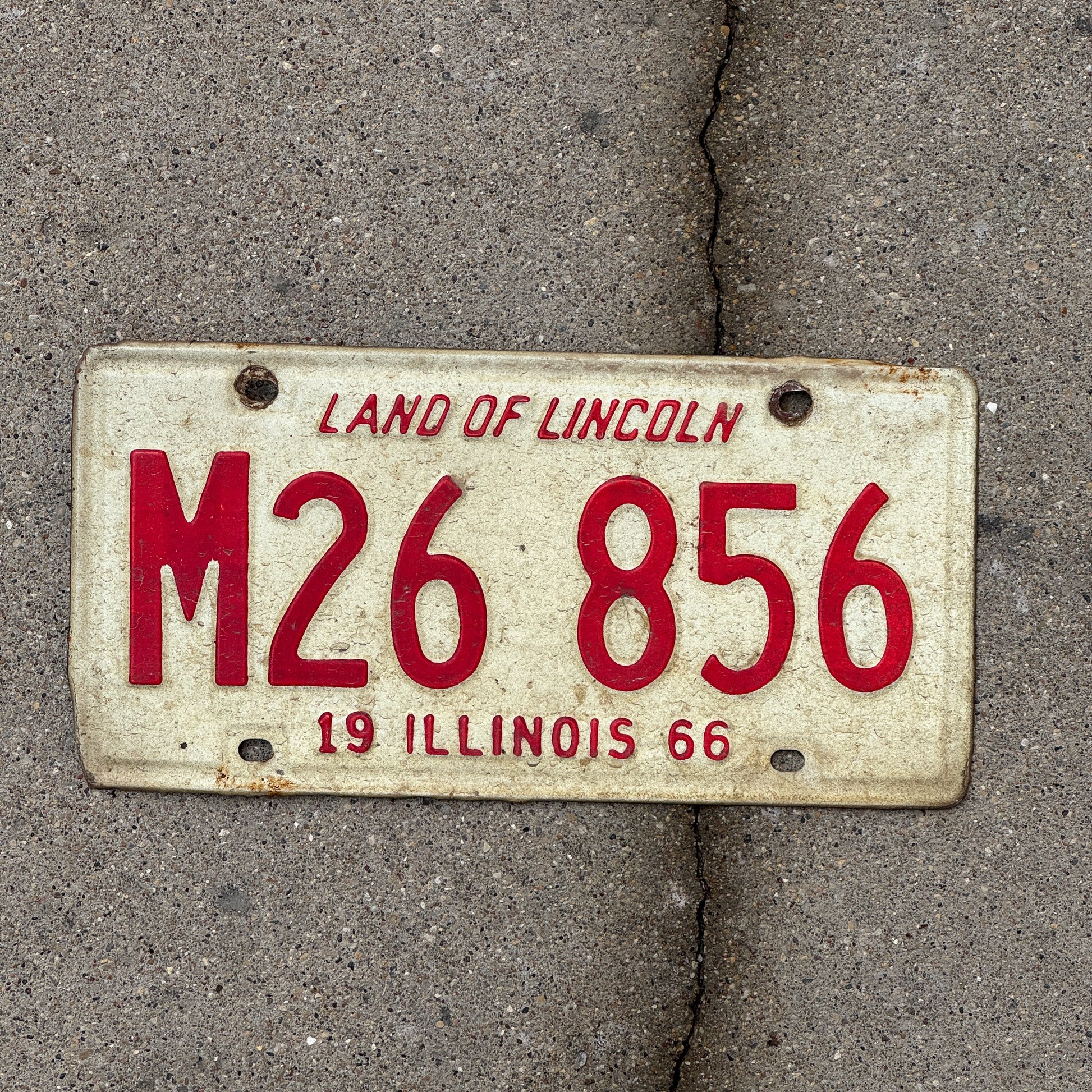 Photo of a 1966 Illinois Municipal License Plate Auto Tag 2 Vintage Garage M 26 856 with original patina