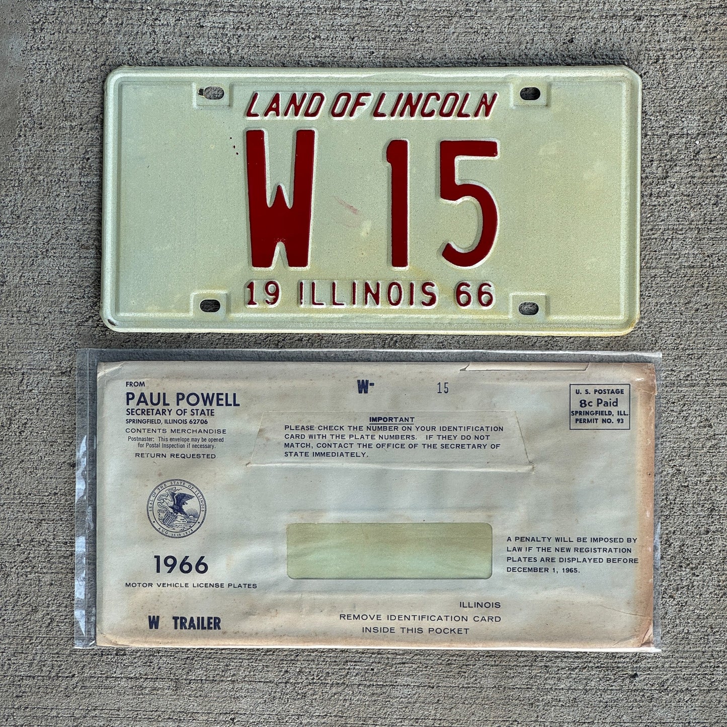 Photo of a 1966 Illinois Trailer License Plate Auto Tag Garage Decor Vintage Low Number Two Digit with Envelope W 15 with original patina