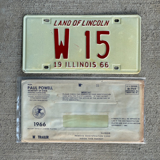 Photo of a 1966 Illinois Trailer License Plate Auto Tag Garage Decor Vintage Low Number Two Digit with Envelope W 15 with original patina