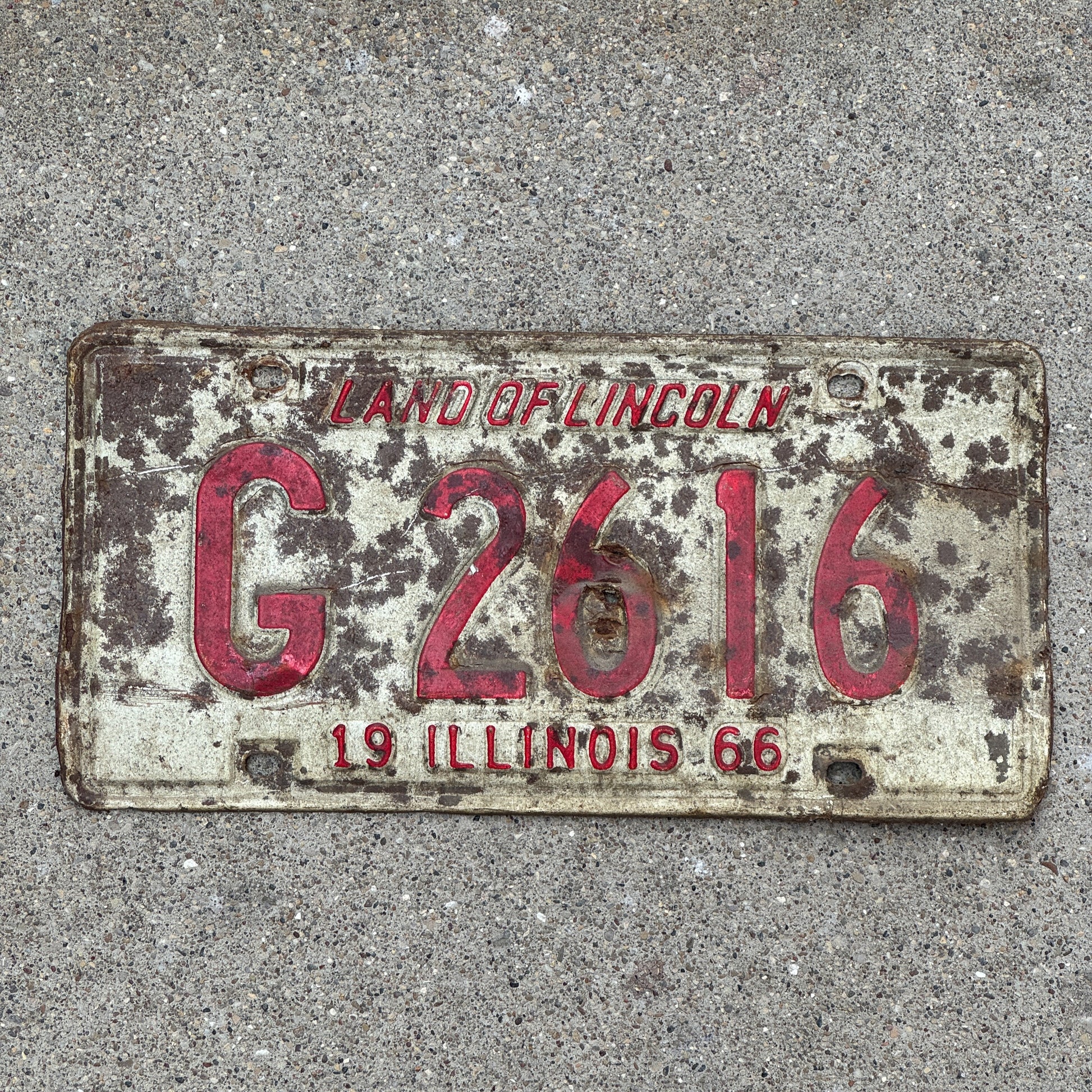 Photo of a 1966 Illinois Truck License Plate Auto Tag 1 Vintage Garage G 2616 with original patina