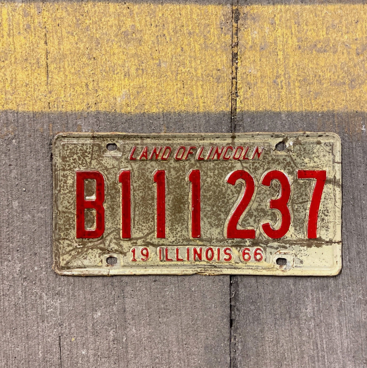 Photo of a 1966 Illinois Truck License Plate Auto Tag Garage Decor Vintage Repeat Repeating B 111 237 with original patina