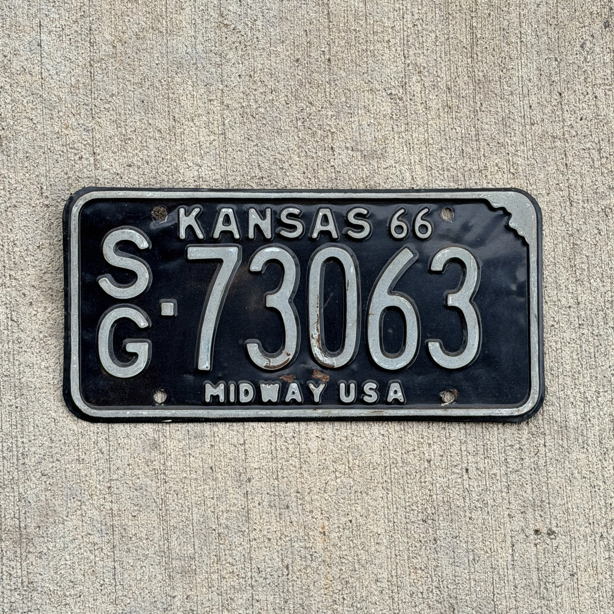 Photo of a 1966 Kansas License Plate Auto Tag Garage Decor Vintage SG 73063 with original patina