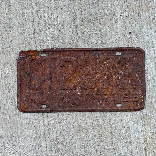 Photo of a 1966 Manitoba Commercial License Plate Auto Tag Garage Decor Vintage CT 2372 with original patina