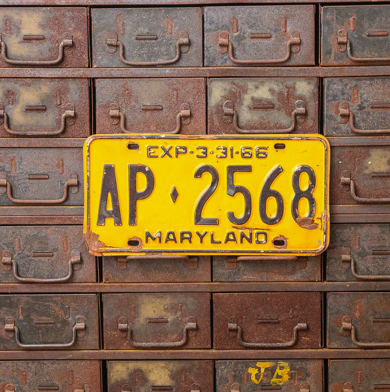 Photo of a 1966 Maryland License Plate Auto Tag Garage Decor Vintage AP 2568 with original patina