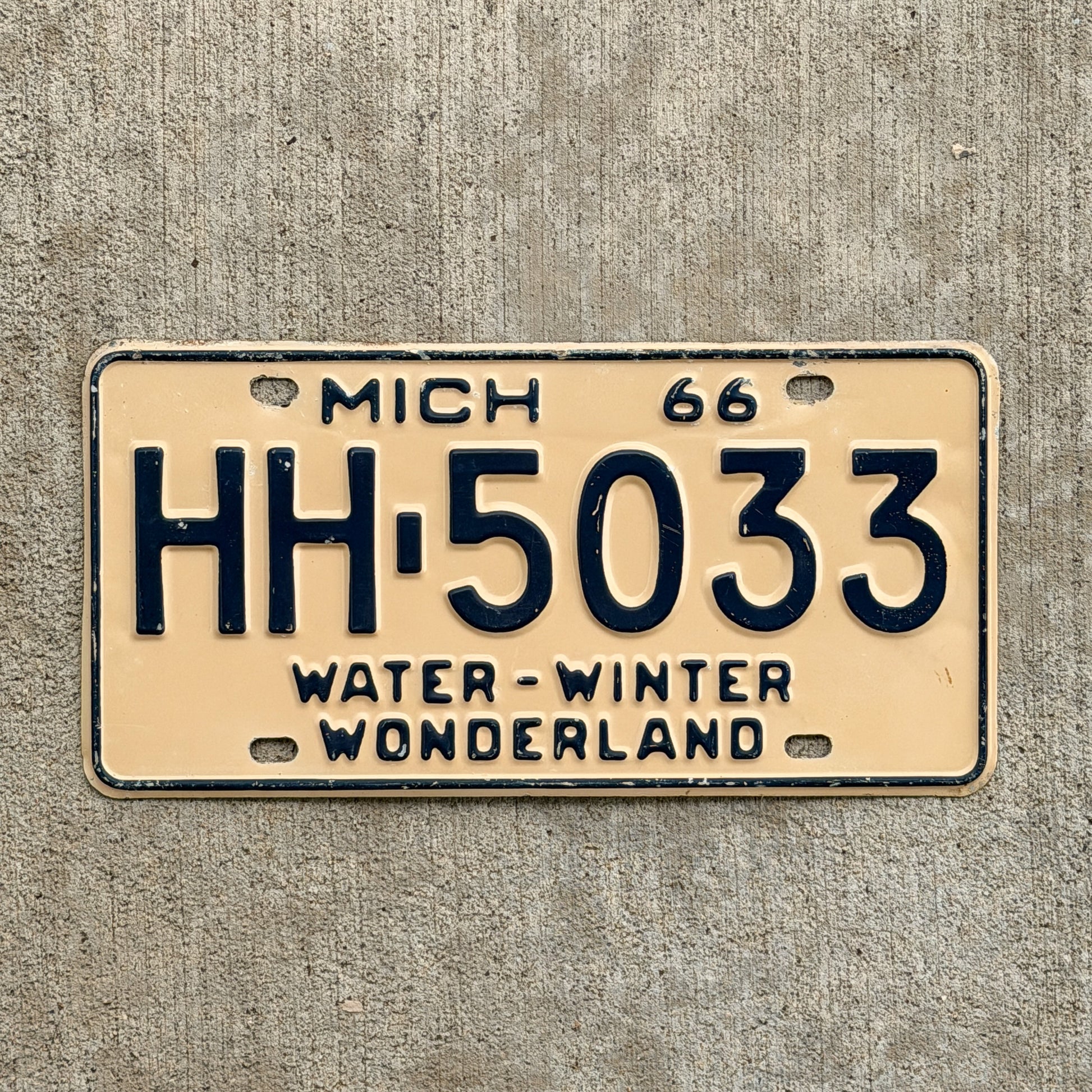 Photo of a 1966 Michigan License Plate Auto Tag Garage Decor Vintage HH 5033 with original patina