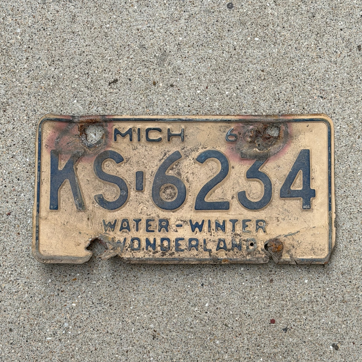 Photo of a 1966 Michigan License Plate Auto Tag Garage Decor Vintage KS 6234 with original patina