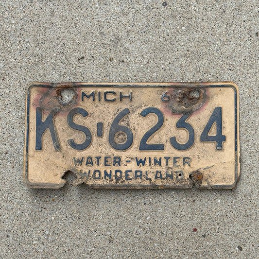 Photo of a 1966 Michigan License Plate Auto Tag Garage Decor Vintage KS 6234 with original patina