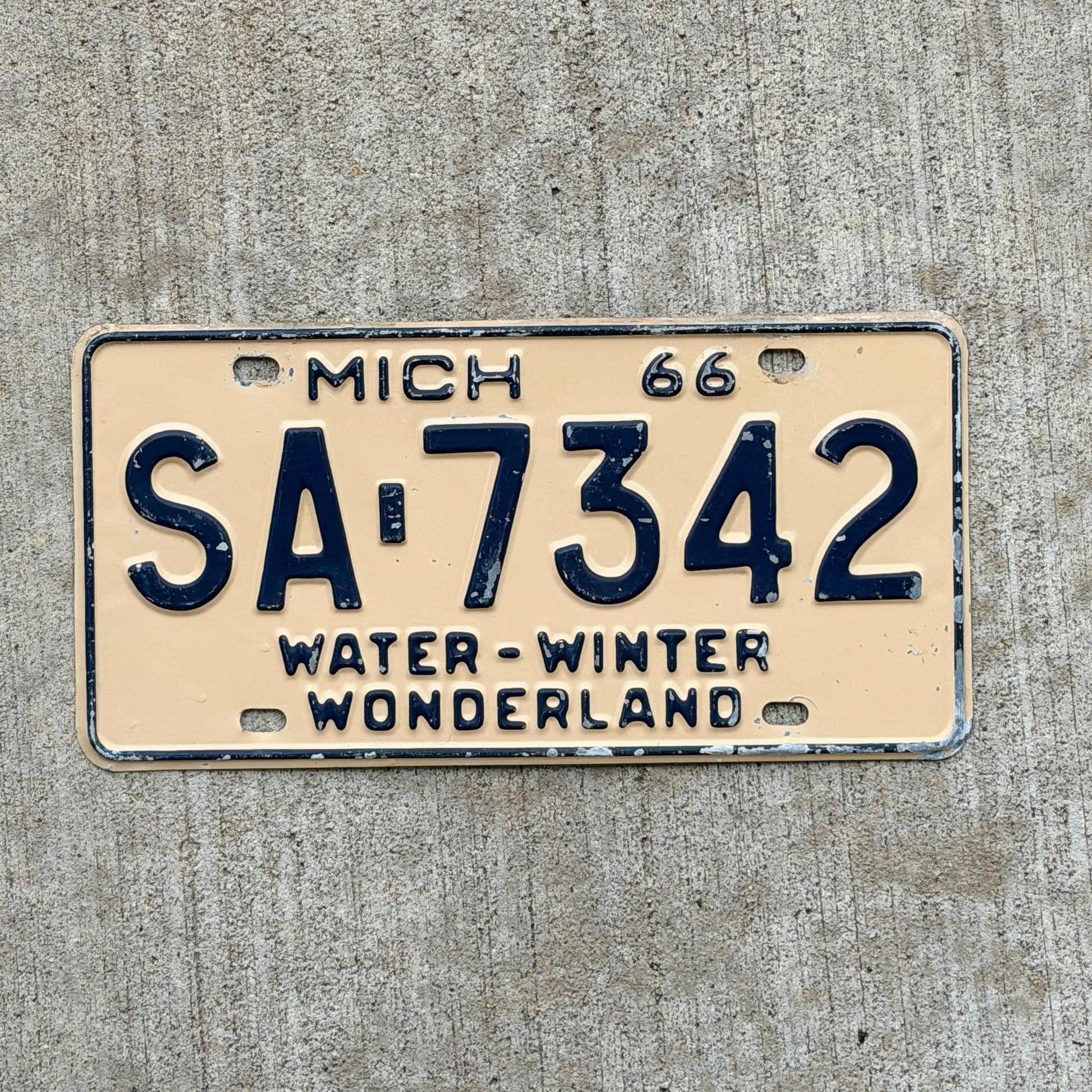 Photo of a 1966 Michigan License Plate Auto Tag Garage Decor Vintage SA 7342 with original patina