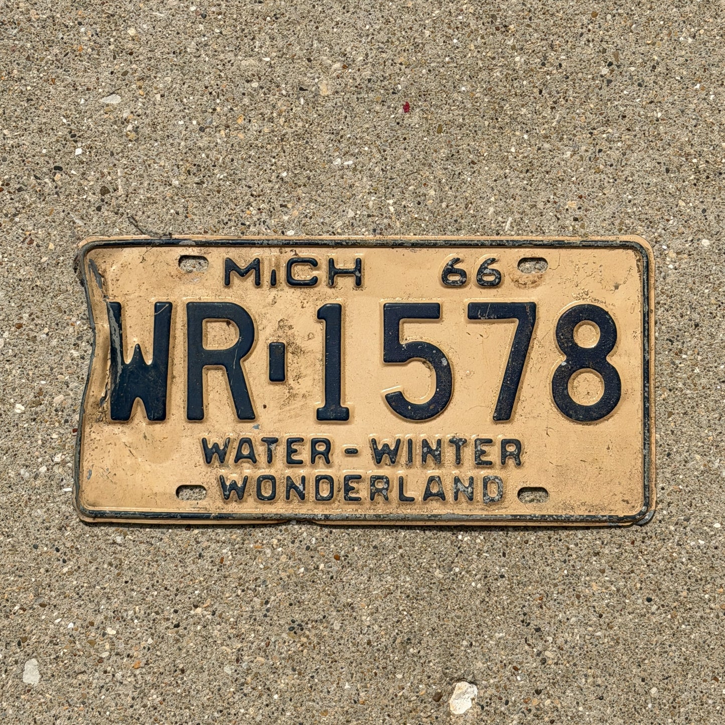 Photo of a 1966 Michigan License Plate Auto Tag Garage Decor Vintage WR 1578 with original patina