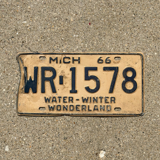 Photo of a 1966 Michigan License Plate Auto Tag Garage Decor Vintage WR 1578 with original patina
