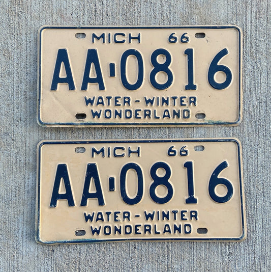 Photo of a 1966 Michigan License Plate Pair Auto Tag Garage Decor Vintage Earliy in Series AA Block AA 0816 with original patina