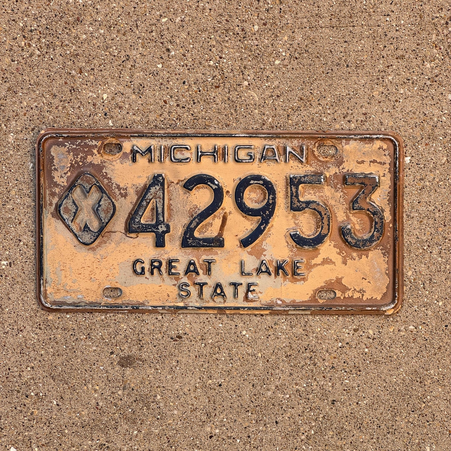 Photo of a 1966 Michigan Municipal License Plate Auto Tag Garage Decor Vintage X Prefix 42953
