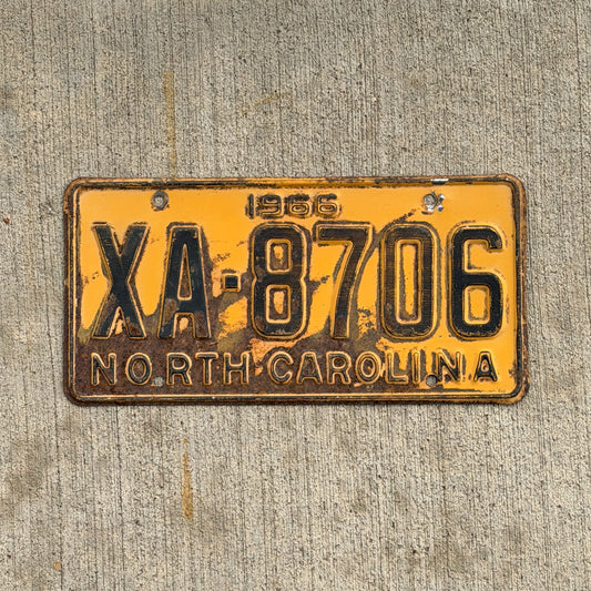 Photo of a 1966 North Carolina License Plate Auto Tag Garage Decor Vintage XA 8706 with original patina