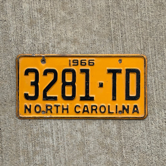 Photo of a 1966 North Carolina Truck License Plate Auto Tag Garage Decor Vintage 3281 TD with original patina